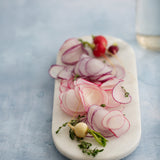 Aria Food Photography Background with fresh sliced radishes