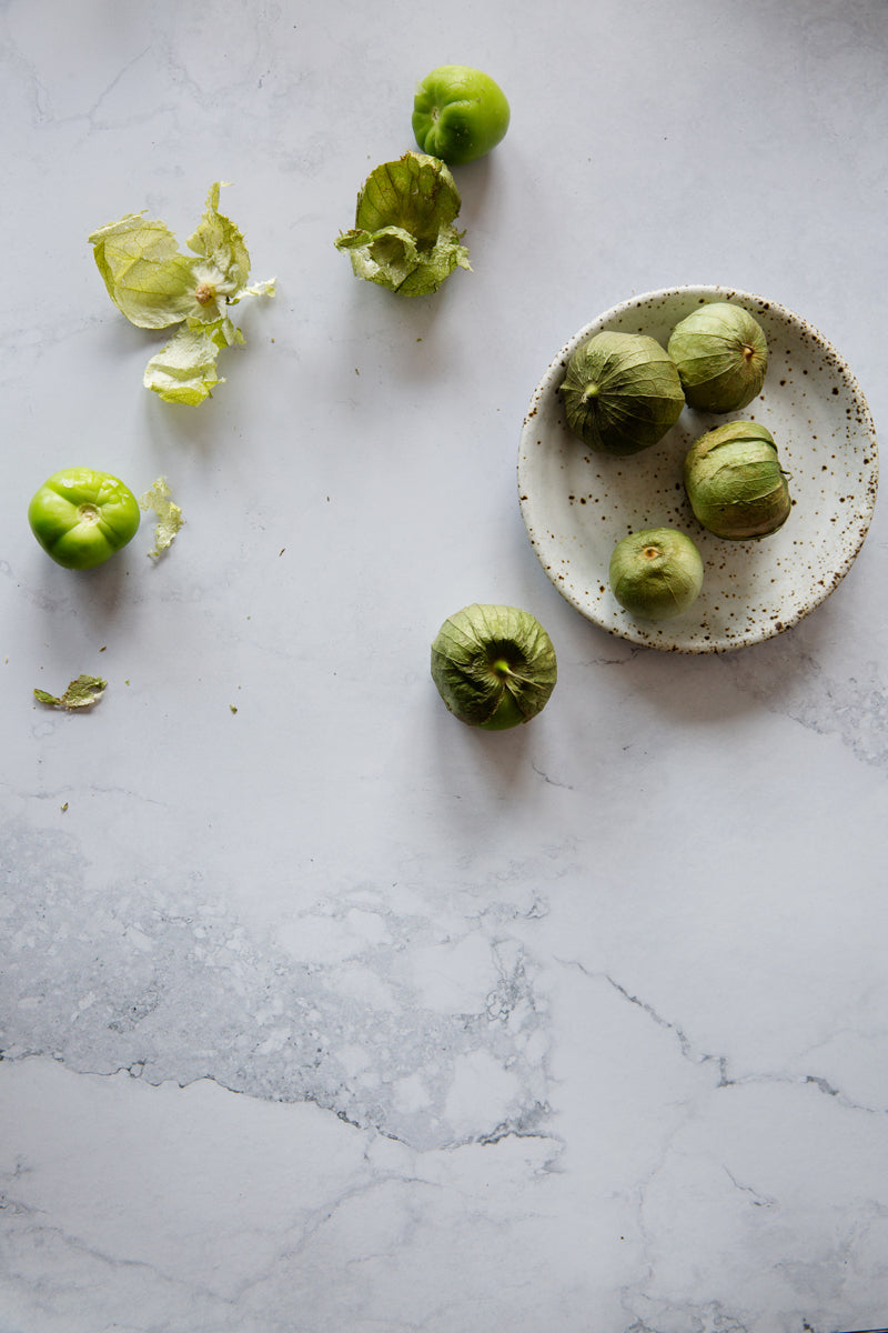 Claude Food Photography Background with bowl of tomatillos