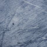 Dark and moody blue stone photography surface