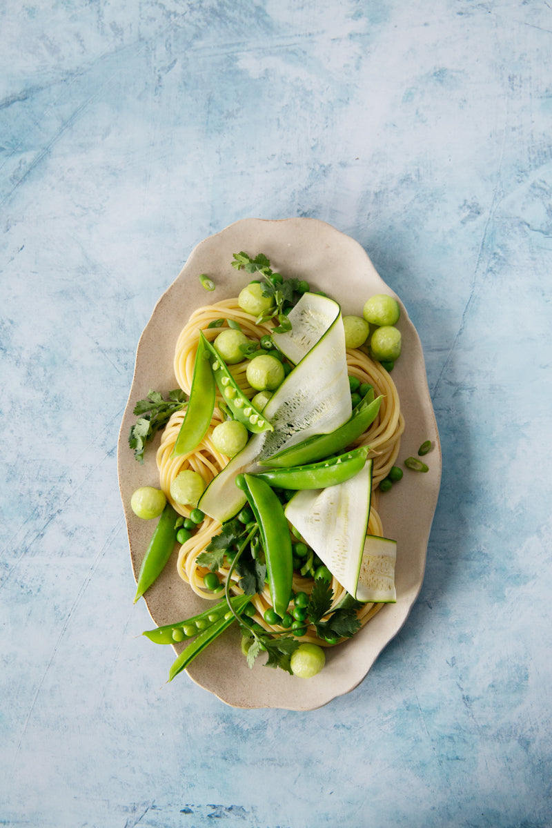 Fiona Food Photography Background with platter of pasta and green vegetables