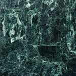 Dark and moody green stone photography surface