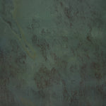 Dark and moody green stone photography surface