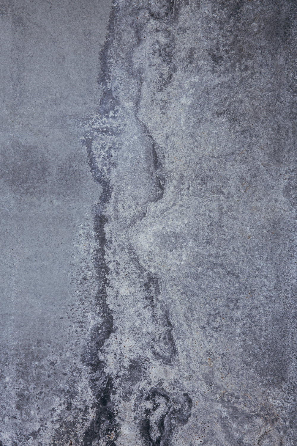 Rustic dark and moody blue metal photography surface
