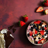 Scarlet Food Photography Background with bowl of yogurt with fruit, nuts and chocolate