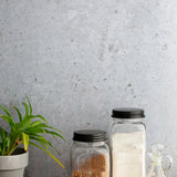 Gray stone photography background with baking ingredients in front