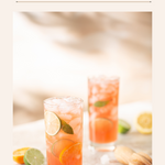 Two glasses of pink lemonade with lime slices on a marble surface, with text 'Artificial Light for Food Photography' above.