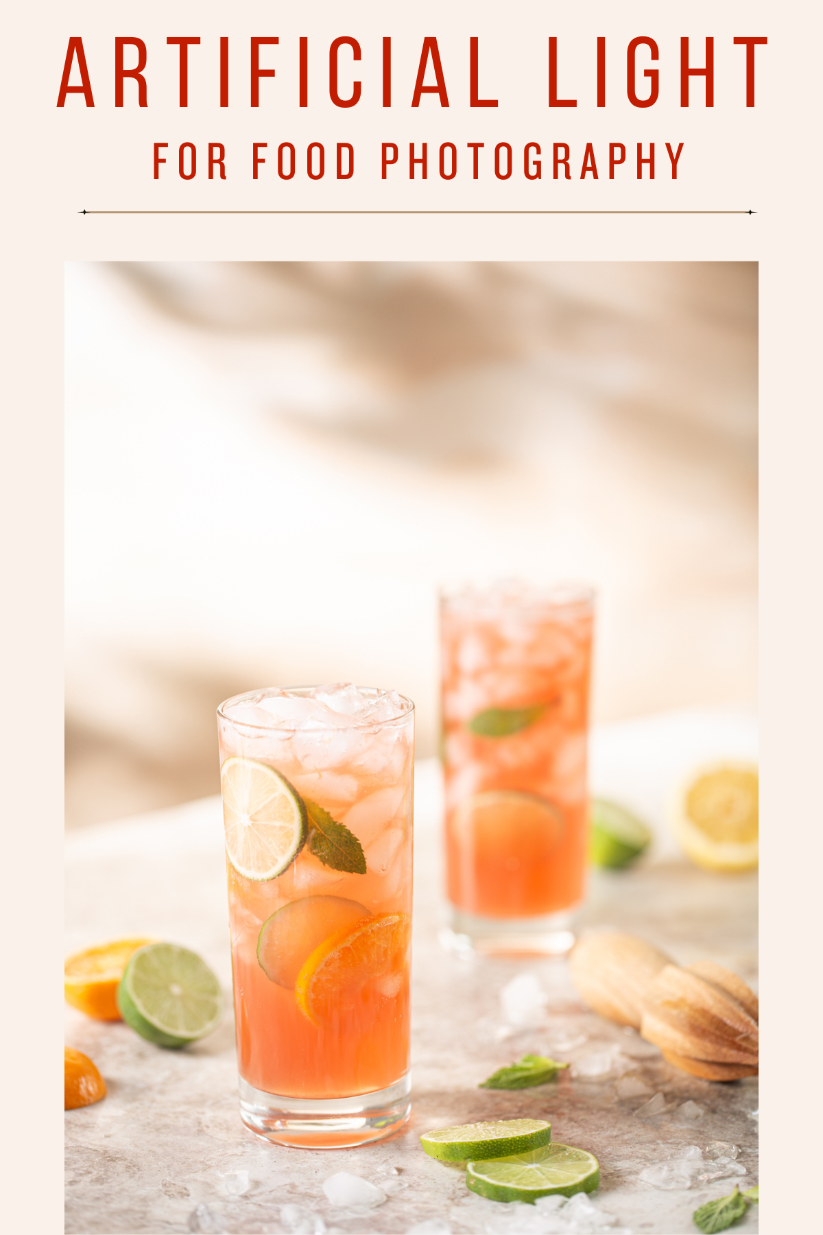 Two glasses of pink lemonade with lime slices on a marble surface, with text 'Artificial Light for Food Photography' above.