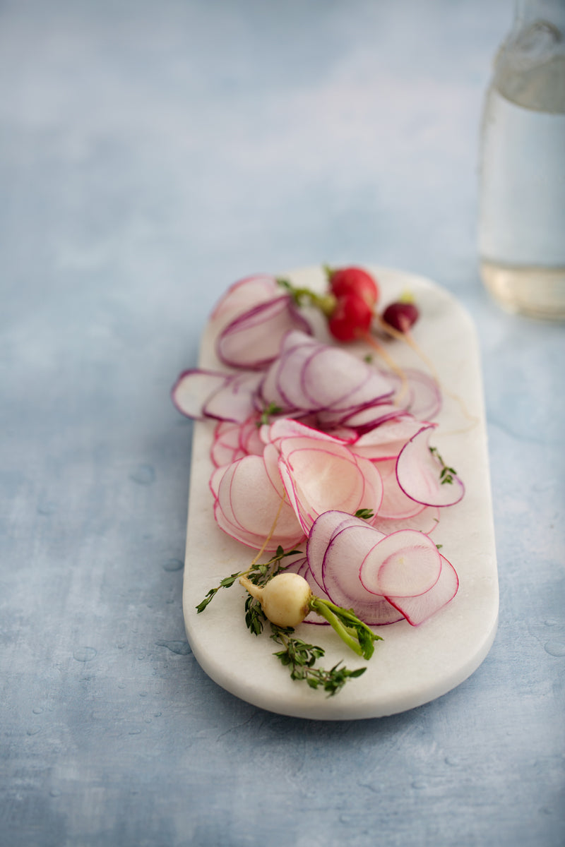 Aria Food Photography Background with fresh sliced radishes