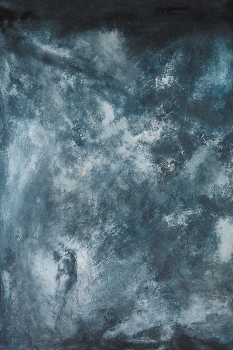 Dark and moody blue painted photography surface