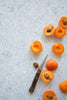 Caspian Food Photography Background with sliced apricots and knife