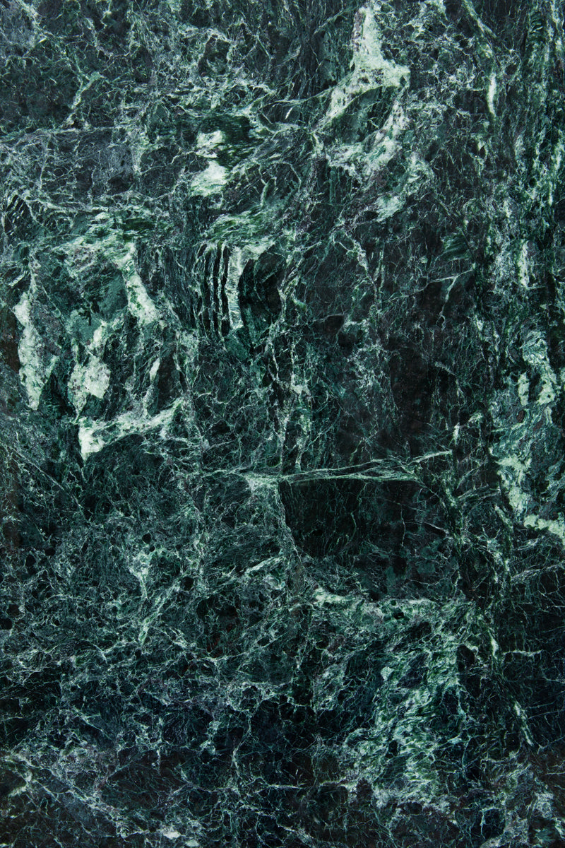 Dark and moody green stone photography surface
