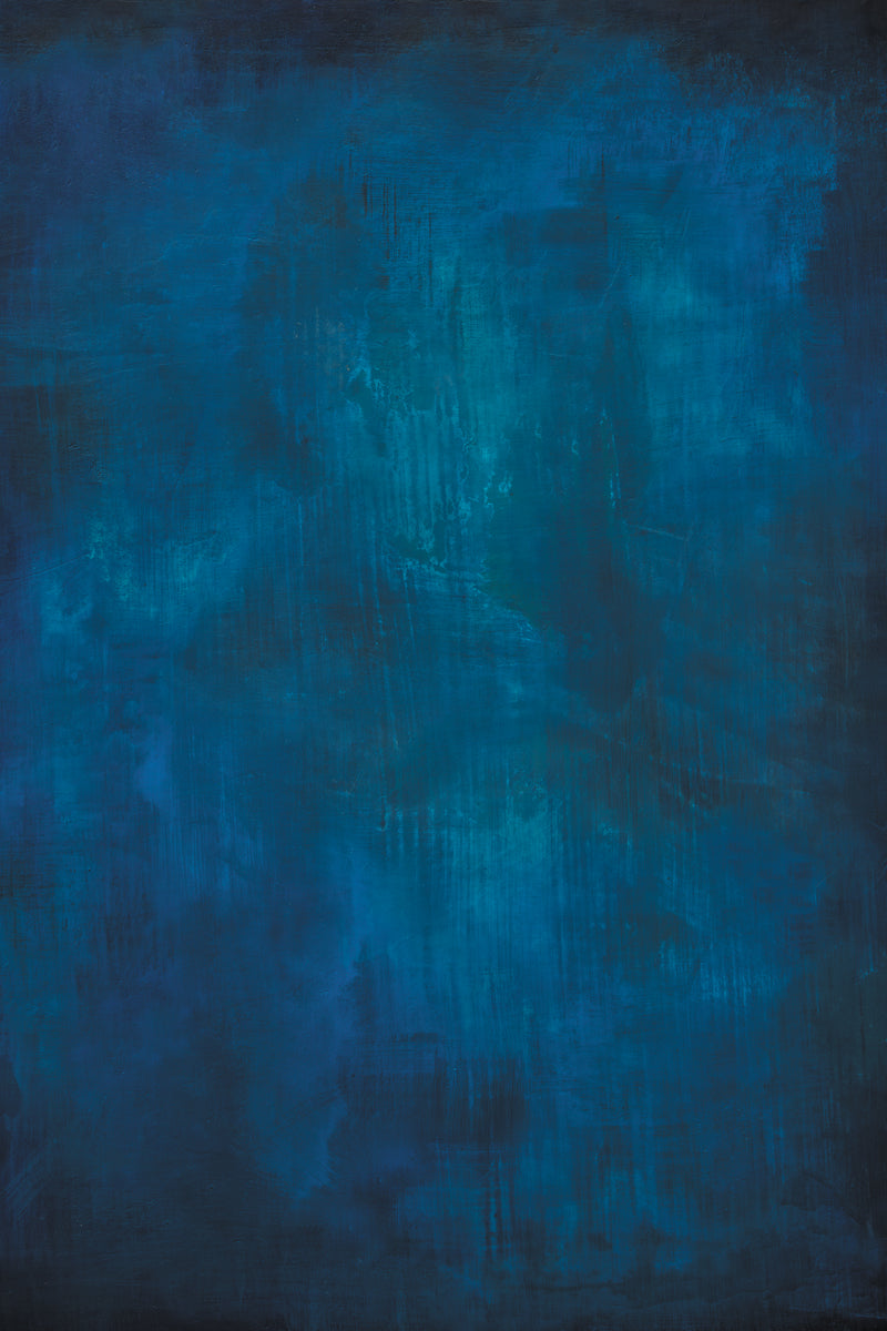 Dark and moody blue painted photography surface