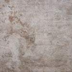 Rustic, warm-toned stone photography surface