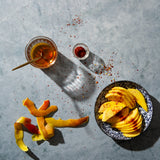 Skye Food Photography Background with sliced mango, honey and chili flakes